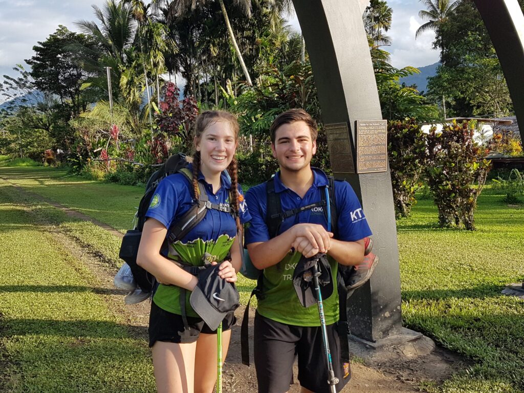 Participants wear matching shirts featuring the Kokoda Track logo and the words "Courage, Endurance, Mateship, Sacrifice".