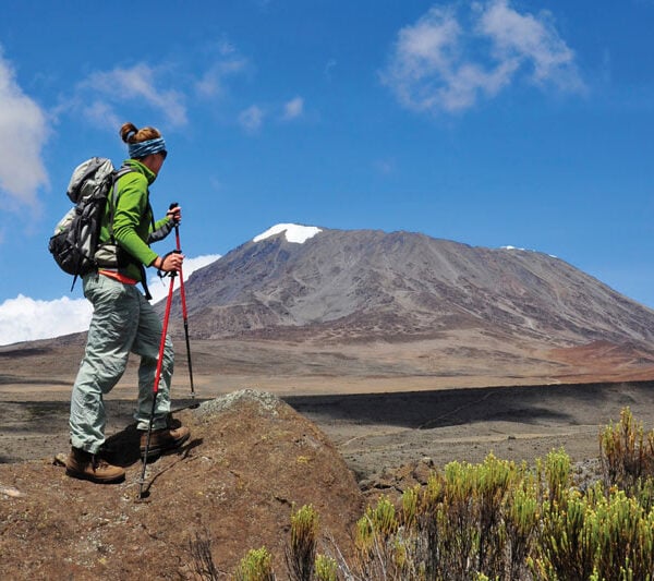 A woman hiking in Mt Kilimanjaro
