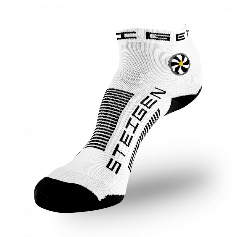 A white low-cut athletic sock with a black toe and heel. It features a circular white and yellow flower-like graphic on the ankle. The brand name "STEIGEN" is printed in black on the foot with black horizontal stripes across the arch.
