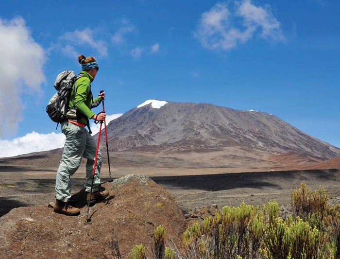A woman hiking in Mt Kilimanjaro.